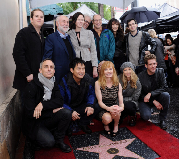 Marg Helgenberger reçoit son étoile devant ses collègues des Experts, à Los Angeles, le 23 janvier 2012
