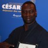 Omar Sy, nommé meilleur acteur pour Intouchables, lors du déjeuner des nommés aux César au Fouquet's à Paris le 4 février 2012