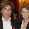 Jean-Michel Jarre et son ancienne compagne Charlotte Rampling à l'Élysée où Nicolas Sarkozy a décoré onze personnalités des arts et du spectacle, le 14 mars 2012.