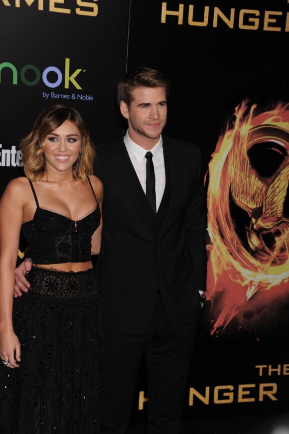 Miley Cyrus et Liam Hemworth le 12 mars 2012 à la première à Los Angeles de The Hunger Games