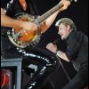 Philippe Uminski en 2009 à la guitare sur la scène du Tour 66 de Johnny Hallyday, dont il était le directeur musical.
