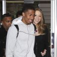 Mariah Carey, accompagnée de son mari Nick Cannon, arrive à l'aéroport d'Innsbruck. Le 30 avril 2012.