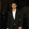 Novak Djokovic, très à l'aise sur un podiume, présente sa nouvelle tenue pour Roland Garros issue de sa collaboration avec son nouvel équipementier Uniqlo le 23 mai 2012 à Paris
