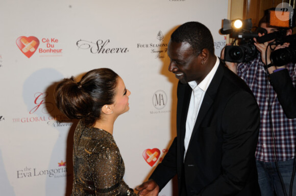 Omar Sy et Eva Longoria au Global Gift Gala, à l'hôtel George V à Paris, le 28 mai 2012