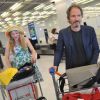 Julie Depardieu et Christopher Thompson arrivant à l'aéroport - Paris le 28 mai 2012
