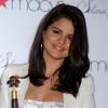 Selena Gomez présente son parfum The Debut Fragrance, dans un magasin Macy's à New York City, le samedi 9 juin 2012.