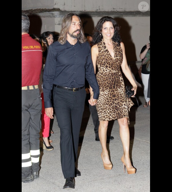 Lisa Edelstein en robe panthère et son compagnon Robert Russell lors d'une soirée à Taormina, en Sicile, le 26 juin 2012