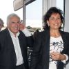 Anne Sinclair et Dominique Strauss-Kahn à l'aéroport de New York pour le grand retour à Paris, le 3 septembre 2011.