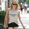 Emma Roberts dans les rues de New York le 10 juillet 2012 ne quitte plus ses bottes Chloé qu'elle met avec toutes ses tenues, même en été !