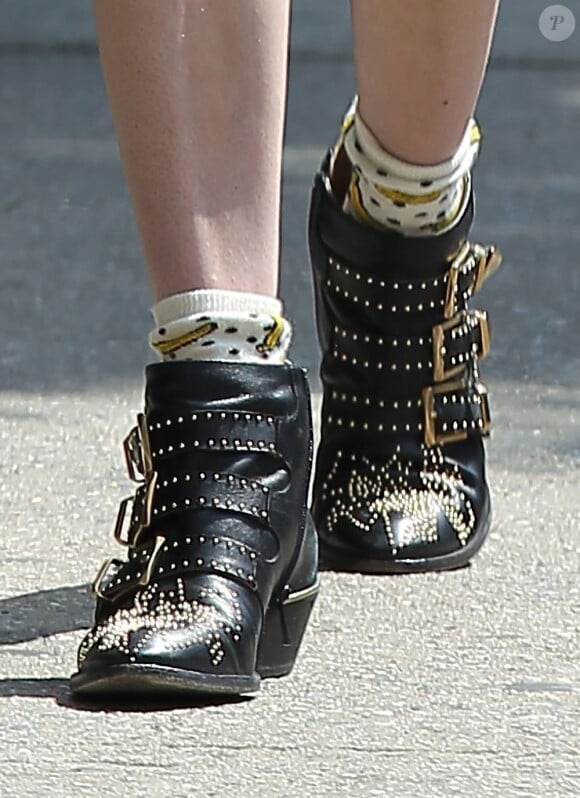 Emma Roberts ne quitte plus ses mini-bottes Chloé qu'elle met avec toutes ses tenues, même en été ! Ici, l'actrice se balade à New York le 10 juillet 2012