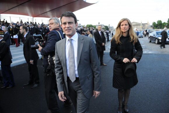 Manuel Valls et sa femme Anne Gravoin au défilé militaire de la Fête nationale, le 14 juillet 2012.