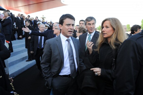 Manuel Valls et sa femme Anne Gravoin au défilé militaire de la Fête nationale, le 14 juillet 2012.