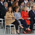 Valérie Trierweiler, un mois après le Twittweilergate des législatives, assistait au défilé militaire de la Fête nationale, le 14 juillet 2012, installée dans la tribune des conjoints des membres du gouvernement, à la gauche de la tribune présidentielle d'où son compagnon François Hollande, chef de l'Etat et des armées, a suivi la parade.