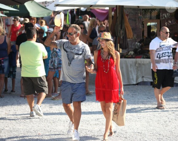 Christian Audigier et sa belle Nathalie Sorensen lors de leur escapade entre l'île de Formentera et Ibiza entre le 18 et le 22 juillet 2012
