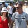 Christian Audigier et sa belle Nathalie Sorensen main dans la main lors de leur escapade entre l'île de Formentera et Ibiza entre le 18 et le 22 juillet 2012