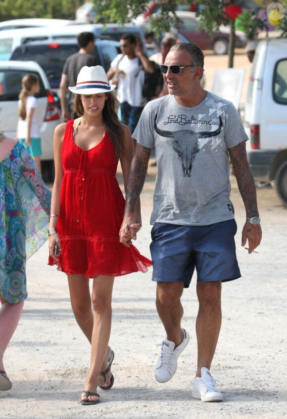 Christian Audigier et sa belle Nathalie Sorensen main dans la main lors de leur escapade entre l'île de Formentera et Ibiza entre le 18 et le 22 juillet 2012