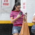 Demi Moore se promène dans les rues de Soho, New York, avec une amie, le 27 juillet 2012.