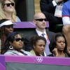 Michelle Obama, entourée de la famille de Serena Williams, assiste à un match de tennis du tournoi Simple dames, à Wimbledon (Londres), le samedi 28 juillet 2012.