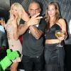 Christian Audigier, sa compagne Nathalie Sorensen et l'animatrice et playmate Victoria Silvstedt, au VIP Room de St-Tropez, le vendredi 27 juillet 2012.
