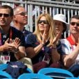  Le clan de supporters de Zara Phillips : son frère Peter avec sa femme Autumn, et son père Mark, dimanche 29 juillet 2012 à Greenwich Park lors de l'épreuve de dressage du concours complet aux Jeux olympiques de Londres. 