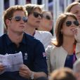 Le prince Harry, avec la princesse Eugenie, a assisté lundi 30 juillet 2012 à Greenwich Park aux excellentes performances de Zara Phillips sur High Kingdom dans l'épreuve de cross du concours complet aux Jeux olympiques de Londres.