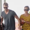 Olivia Munn et son petit ami Joel Kinnaman arrivent à l'aéroport JFK à New York le 30 juillet 2012