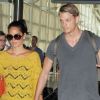 Olivia Munn et son petit ami Joel Kinnaman arrivent à l'aéroport JFK à New York le 30 juillet 2012
