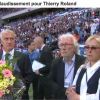 Françoise, veuve de Thierry Roland, soutenue par Jacques Vendroux et son fils Gary.
Deux mois après sa mort, Thierry Roland a été honoré le 15 août 2012 par une standing ovation d'une minute d'applaudissements en préambule au match France-Uruguay au stade Océane du Havre.