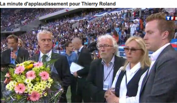 Françoise, veuve de Thierry Roland, soutenue par Jacques Vendroux et son fils Gary.
Deux mois après sa mort, Thierry Roland a été honoré le 15 août 2012 par une standing ovation d'une minute d'applaudissements en préambule au match France-Uruguay au stade Océane du Havre.