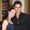 Kristin Davis et John Stamos à la sortie de leur représentation de The New Man, à New York, le 19 août 2012