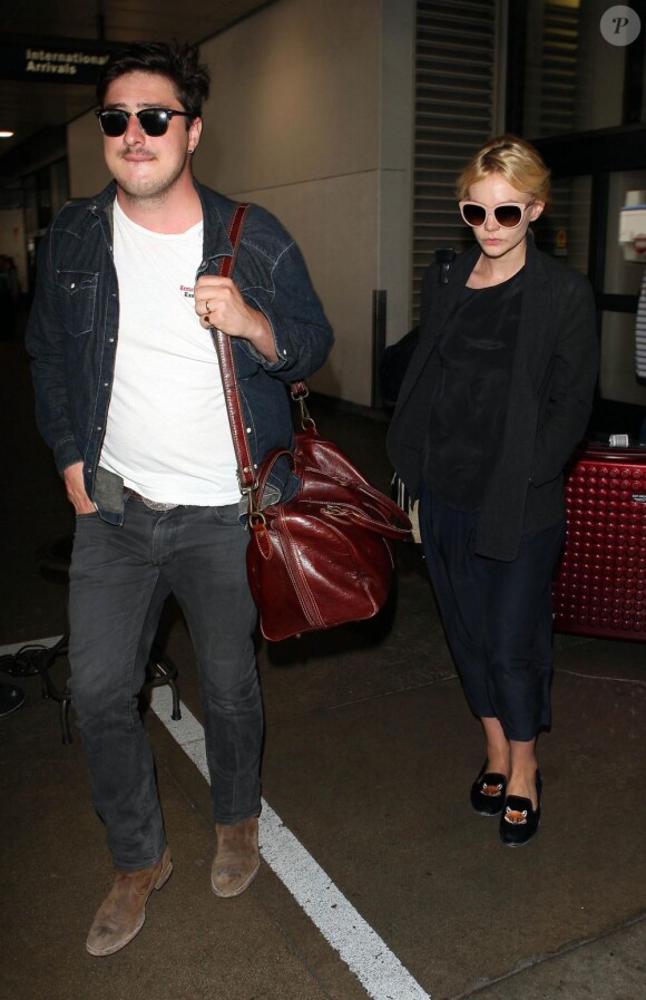 Carey Mulligan et Marcus Mumford de passage à l'aéroport de Los Angeles le 23 août 2012