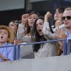 Jennifer Connelly, Paul Bettany et leur fils Stellan lors de la finale de l'US Open entre Serena Williams et Victoria Azarenka le 9 septembre 2012 à New York