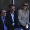 Kevin Spacey, Will Ferrell et son épouse Viveca Paulin lors de la finale de l'US Open entre Serena Williams et Victoria Azarenka le 9 septembre 2012 à New York