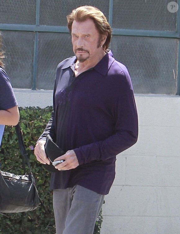 Johnny Hallyday après son passage chez le coiffeur dans le quartier de Beverly Hills, à Los Angeles, le 10 septembre 2012.