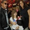 Karole Rocher, en compagnie de l'une de ses filles, aux côtés de son fidèle ami JoeyStarr à Paris le 11 septembre 2012