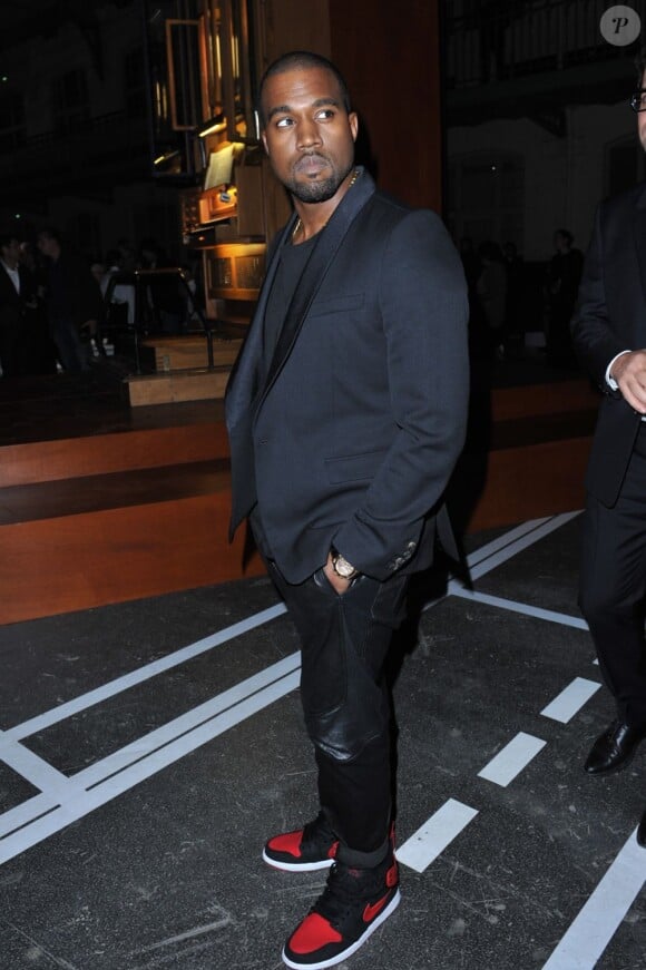 Kanye West arrive au lycée Carnot pour assister au défilé Givenchy prêt-à-porter printemps-été 2013. Paris, le 30 septembre 2012.