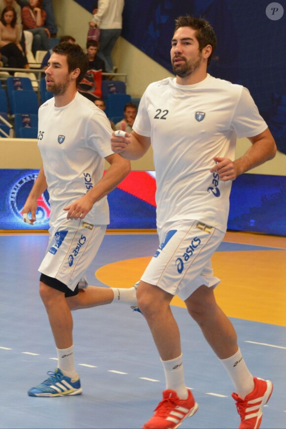 Nikola et Luka Karabatic lors du match entre le PSG Handball et Montpellier au stade Pierre de Coubertin le 30 septembre 2012