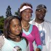 Bobbi Kristina entourée de ses parents Whitney Houston et Bobby Brown, à Anaheim, le 7 août 2004.