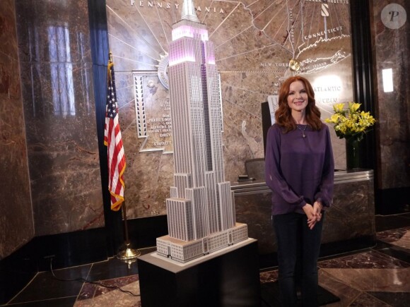 Marcia Cross inaugure la journee internationale de la femme sur l'Empire State Building à New York le 10 octobre 2012.