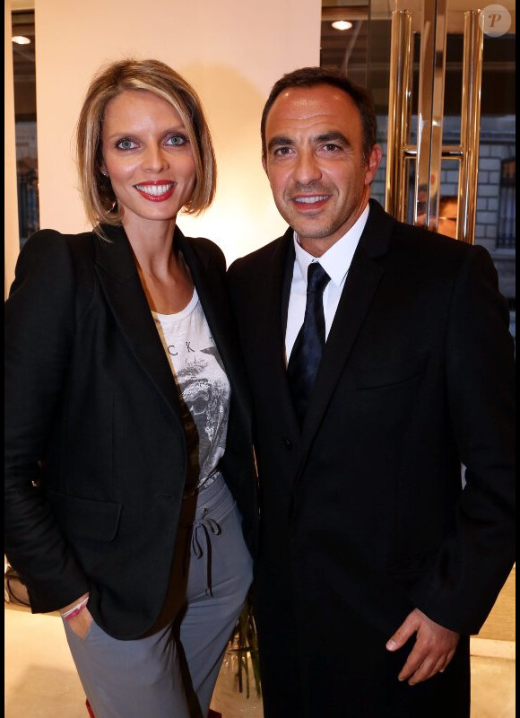 Sylvie Tellier et Nikos Aliagas lors de l'inauguration de la boutique Montagut rue du Faubourg Saint-Honoré ainsi que le lancement du site de vente en ligne de la marque, à Paris le 11 Octobre 2012.