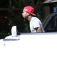 Exclusif - Tyga, surpris à la descente de sa Rolls-Royce et se rendant au Subway. Los Angeles, le 14 octobre 2012.