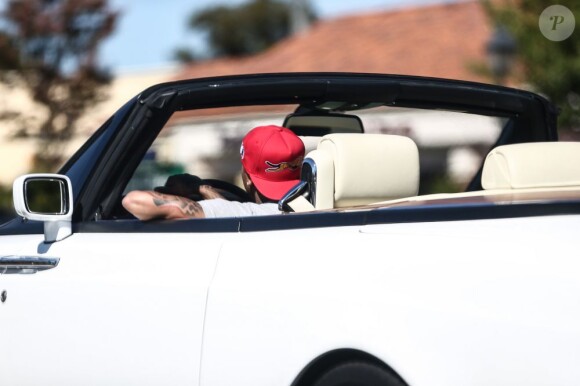 Exclusif - Tyga au volant de sa Rolls-Royce à Los Angeles, le 14 octobre 2012.
