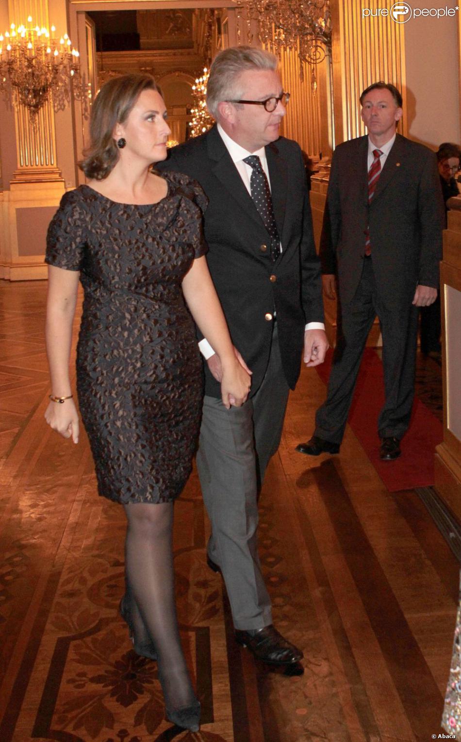  Le prince Laurent et la princesse Claire. La famille royale de Belgique était réunie le 24 octobre 2012 au palais à Bruxelles pour un concert d&#039;automne offert par le couple royal. 