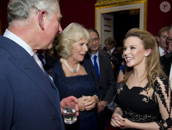 Le prince Charles et la duchesse Camilla sous le charme de Kylie Minogue. Les royaux britanniques donnaient une réception au Palais St James à Londres le 24 octobre 2012 à l'occasion de leur tournée prochaine (en novembre) en Océanie. Kylie Minogue y a chanté.
