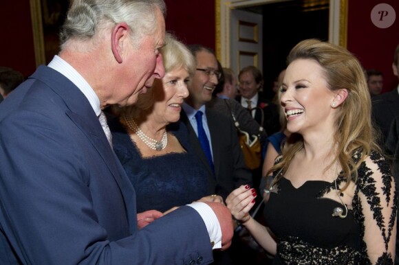 Le prince Charles et la duchesse Camilla sous le charme de Kylie Minogue. Les royaux britanniques donnaient une réception au Palais St James à Londres le 24 octobre 2012 à l'occasion de leur tournée prochaine (en novembre) en Océanie. Kylie Minogue y a chanté.