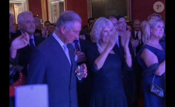 Le prince Charles et Camilla Parker Bowles ravis devant le concert de Kylie Minogue à St. James Palace le 24 octobre 2012.