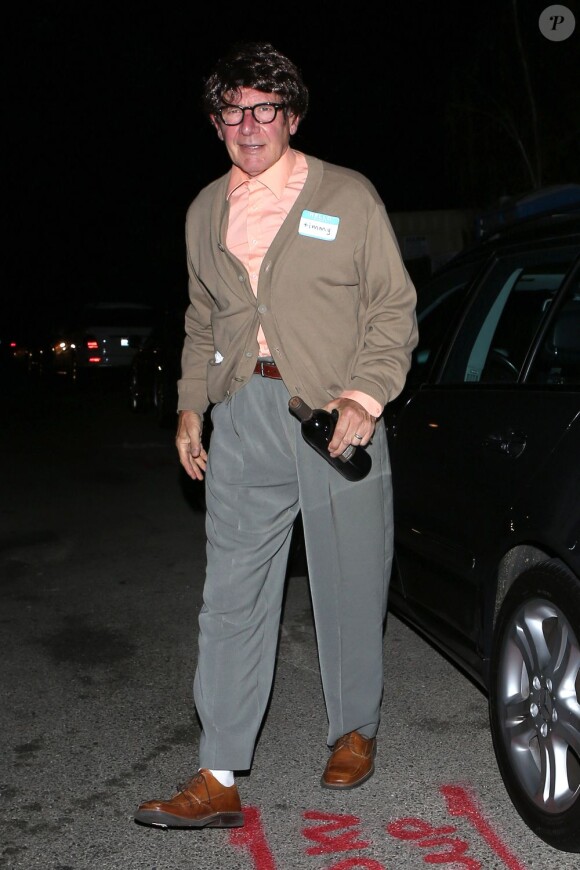 Harrison Ford et sa femme Calista Flockhart déguisés en geek rétro pour se rendre une soirée d'Halloween à Santa Monica le 31 octobre 2012.