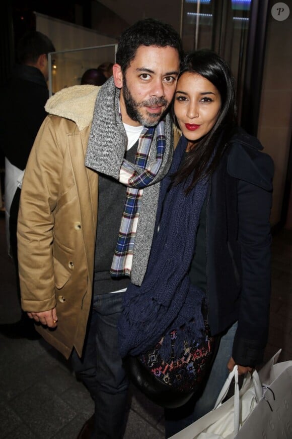 Manu Payet et Leïla Bekthi assistent à la soirée de lancement de la collection Maison Martin Margiela pour H&M dans la boutique H&M des Champs-Élysées. Paris, le 14 novembre 2012.