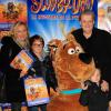 Guy Carlier et sa femme Joséphine accompagnés de leur fils Antoine et du fils de Joséphine lors de l'avant-première de Scooby doo 2 aux Folies Bergère à Paris le 18 novembre 2012