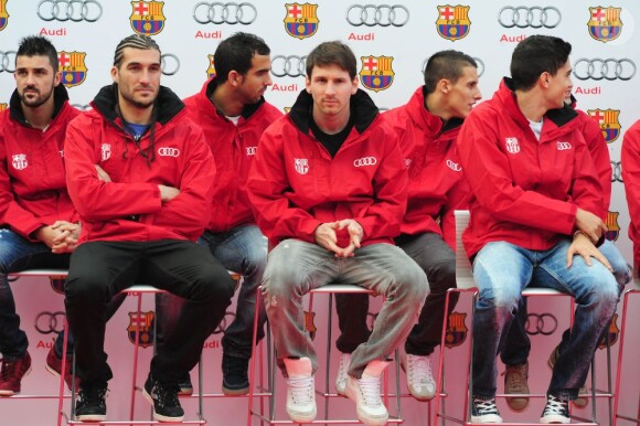 David Villa, Pinto et Lionel Messi lors d'une journée au cours de laquelle les joueurs du FC Barcelone ont reçu leur voiture de fonction de chez Audi à Barcelone le 21 Novembre 2012